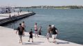 Летний Севастополь: горожане наслаждаются солнцем и морем